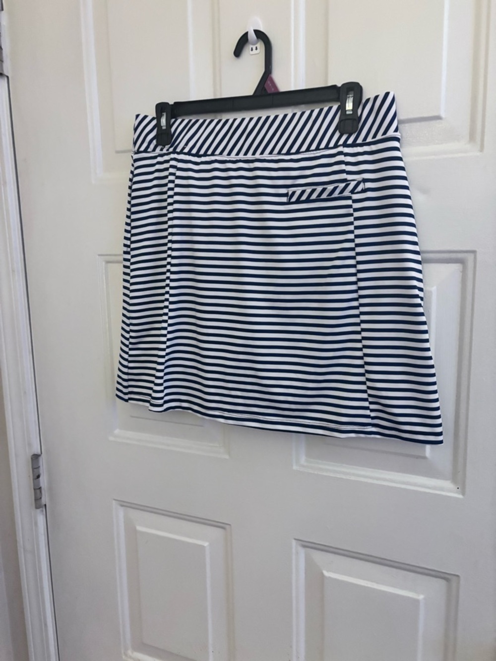 Izod Navy and White Striped Golf Skort with Pleated Flounce - Picture 2 of 6